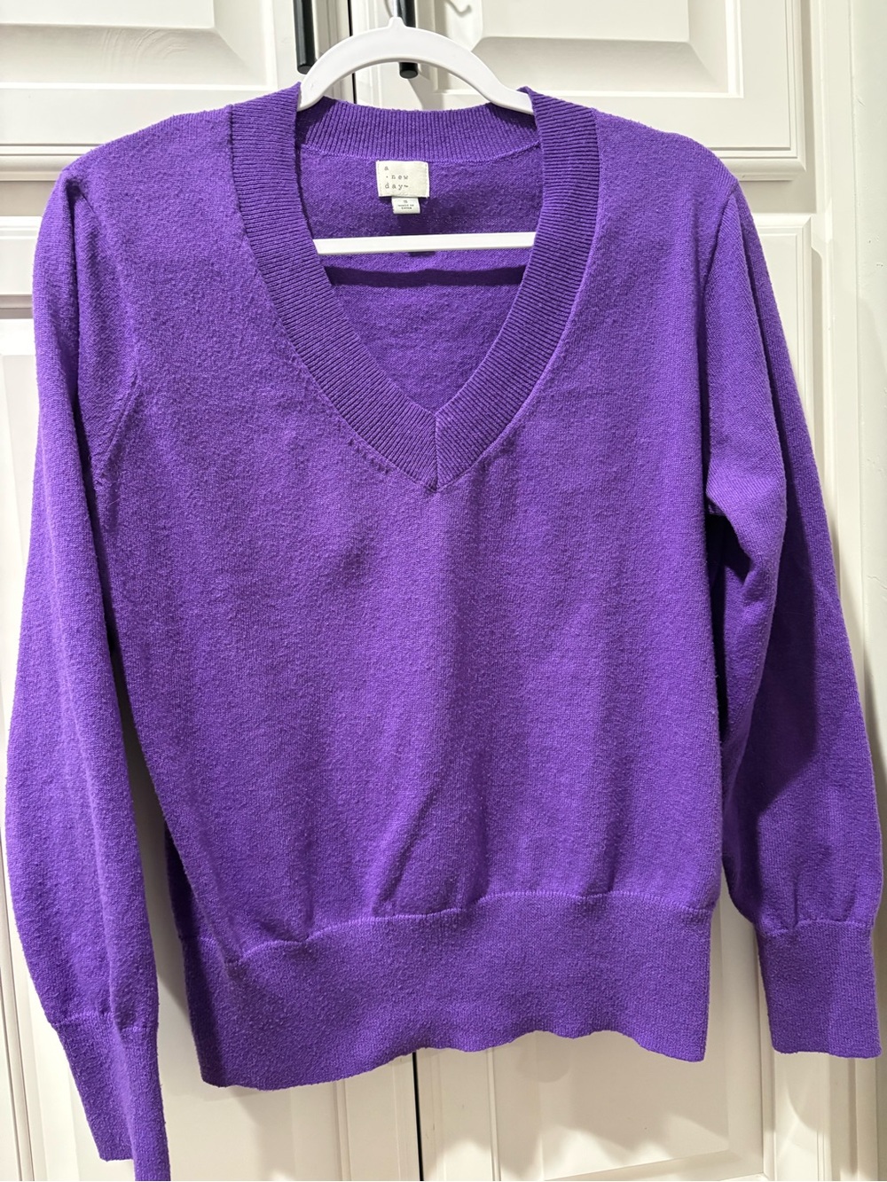a new day V-Neck Sweater in Violet Purple, size small, good used condition.